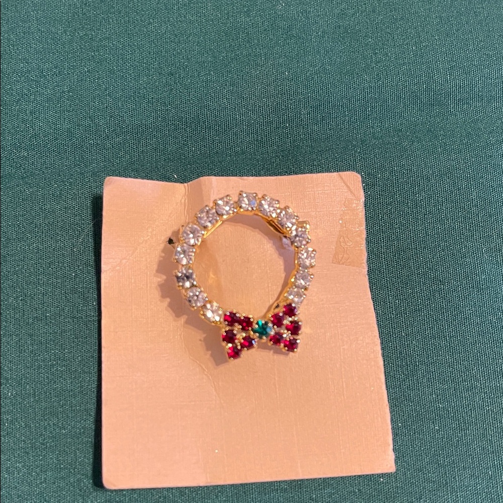Gold Ring with Red and Green Bow